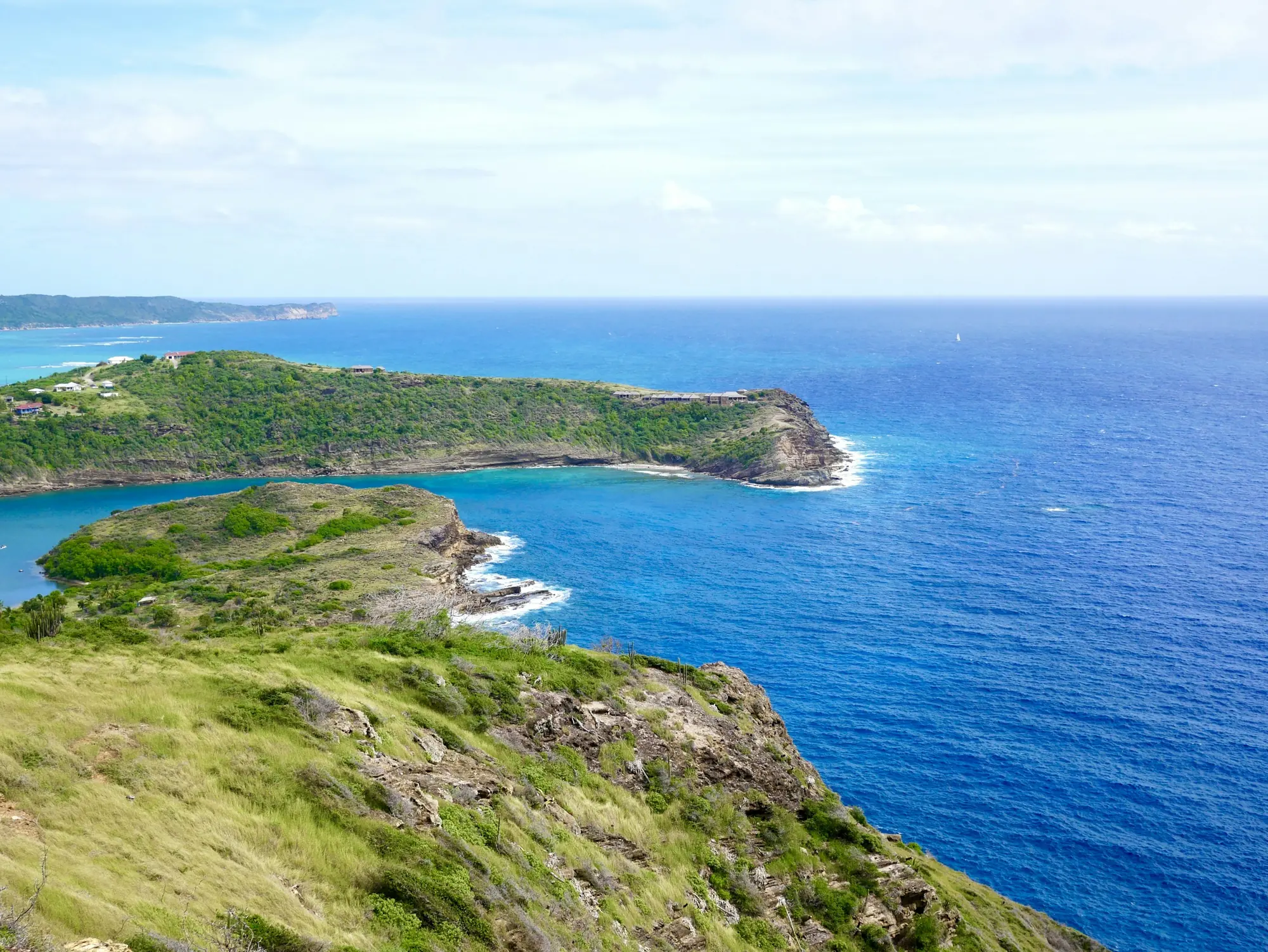 The coast of Antigua and the Caribbean Sea – Caribbean Citizenship by Investment
