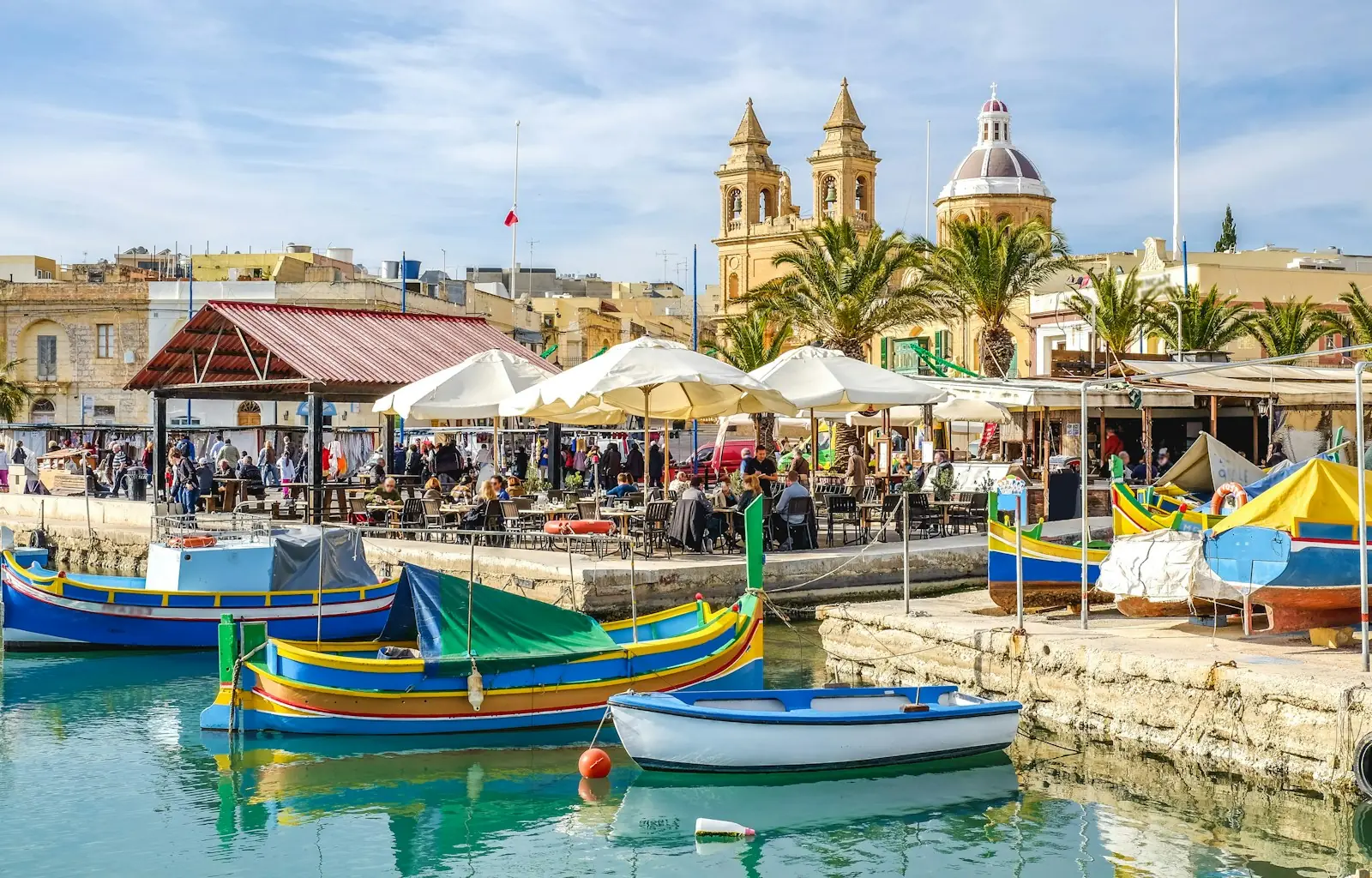 Fishing boats in Marsaxlokk harbour, Malta – Malta Golden Visa