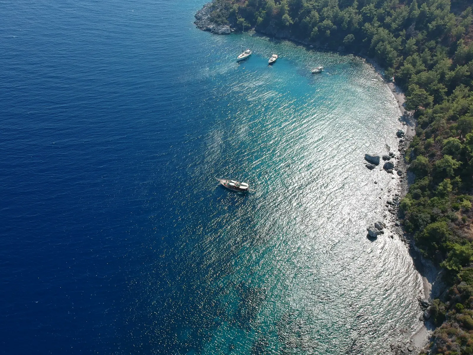 Gulets in a bay near Bodrum, Turkey – Turkey Citizenship by Investment