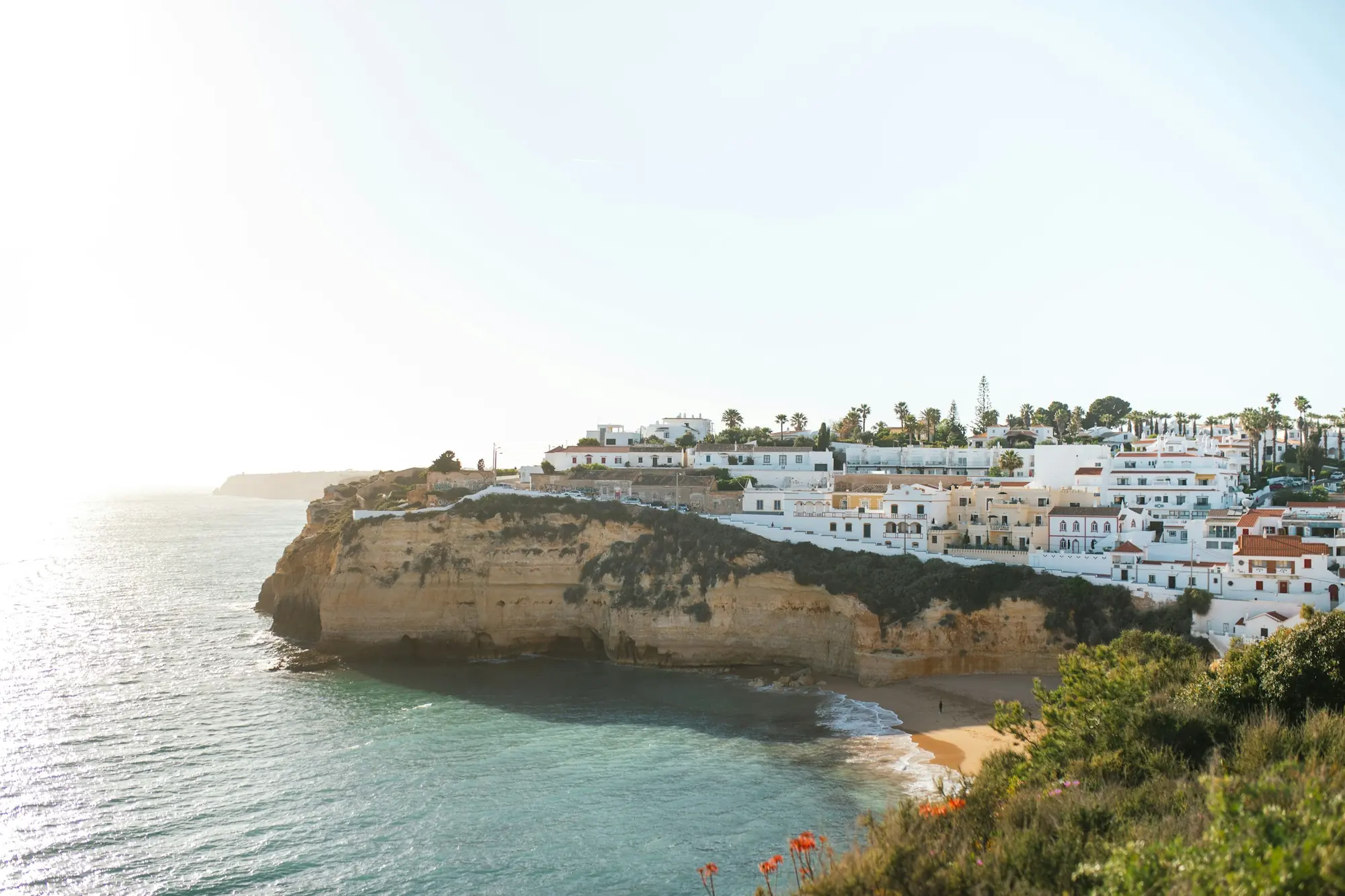 Carvoeiro, Algarve: white houses on the cliffs above the beach – Portugal residency by investment