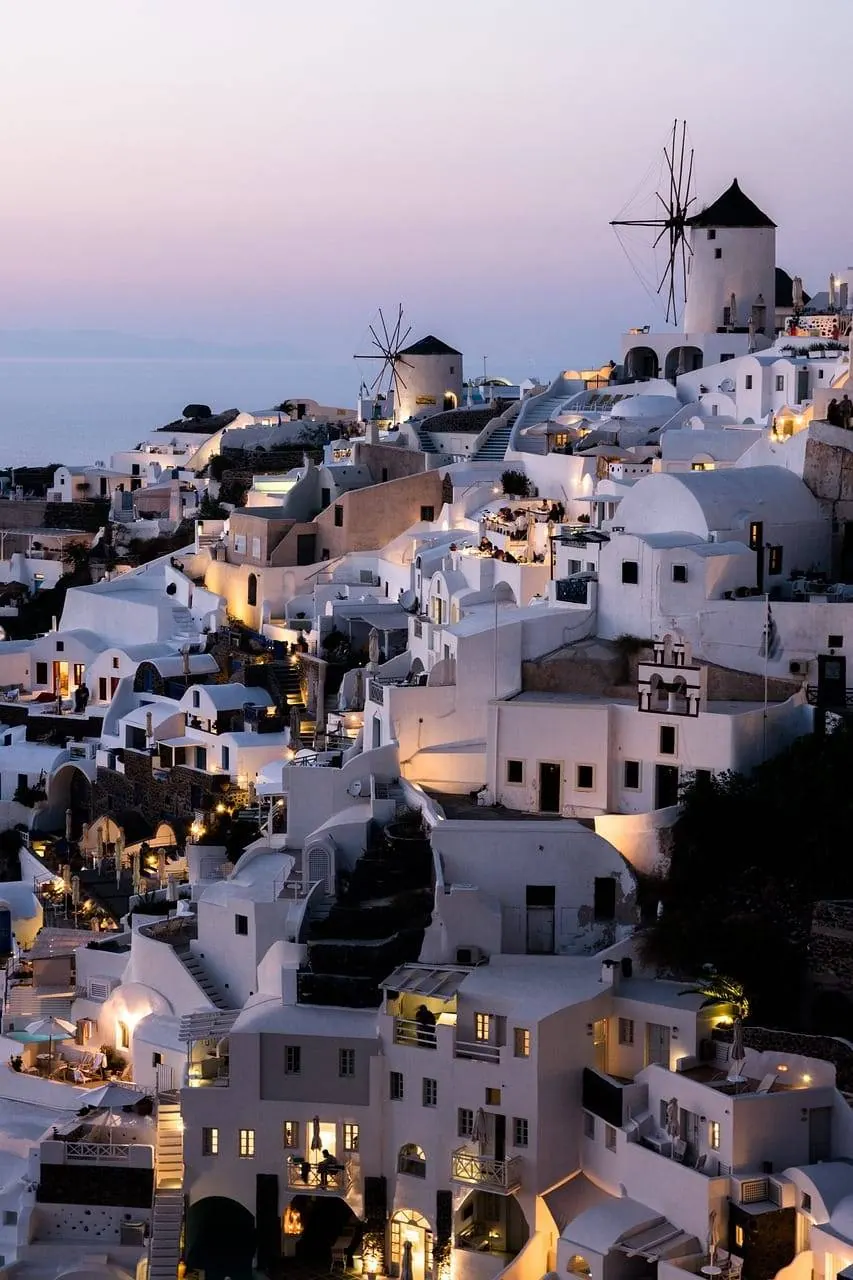 Whitewashed cliffside homes overlooking the sea in Santorini, Greece